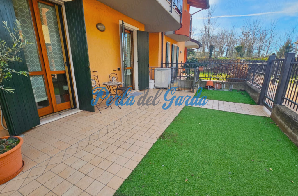 VENDUTO. 496. Castelnuovo d/G. Quadrilocale con giardino, garage, taverna